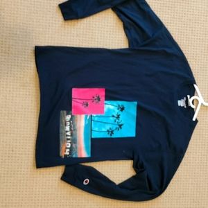 This is a men's champion long sleeve shirt with cool hollywood logos